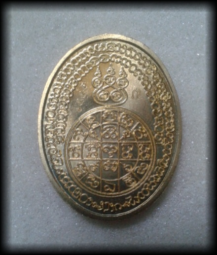 เหรียญนำฤกษ์ หลวงพ่อดับภัย รุ่นดับภัยหายห่วง เนื้อทองฝาบาตร โค๊ด1550